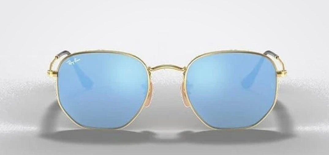 Ray-Ban Hexagonal sunglasses featuring a thin gold metal frame and striking blue mirror lenses (30-day rental)