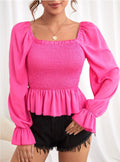 Pink smocked peplum blouse