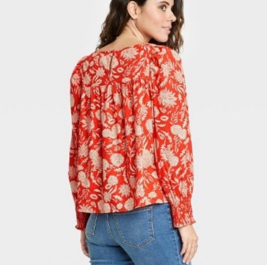 Universal Thread red floral blouse features smocked cuffs and long balloon sleeves (30-day rental)