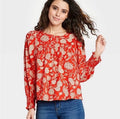 Universal Thread red floral blouse features smocked cuffs and long balloon sleeves (30-day rental)