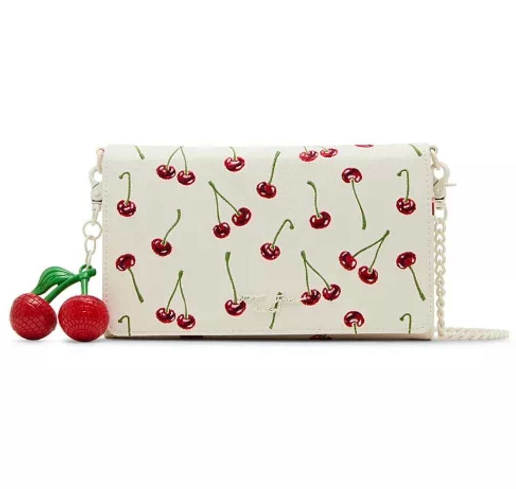 Betsey Johnson "Cherry On Top" crossbody wallet with red cherry print and a playful hanging cherry charm (30-day rental)