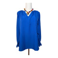long-sleeve V-neck blouse