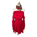 On or off-the-shoulder mini dress with an elastic waist, long sleeves with ruffled cuffs, and a ruffled hem line - M